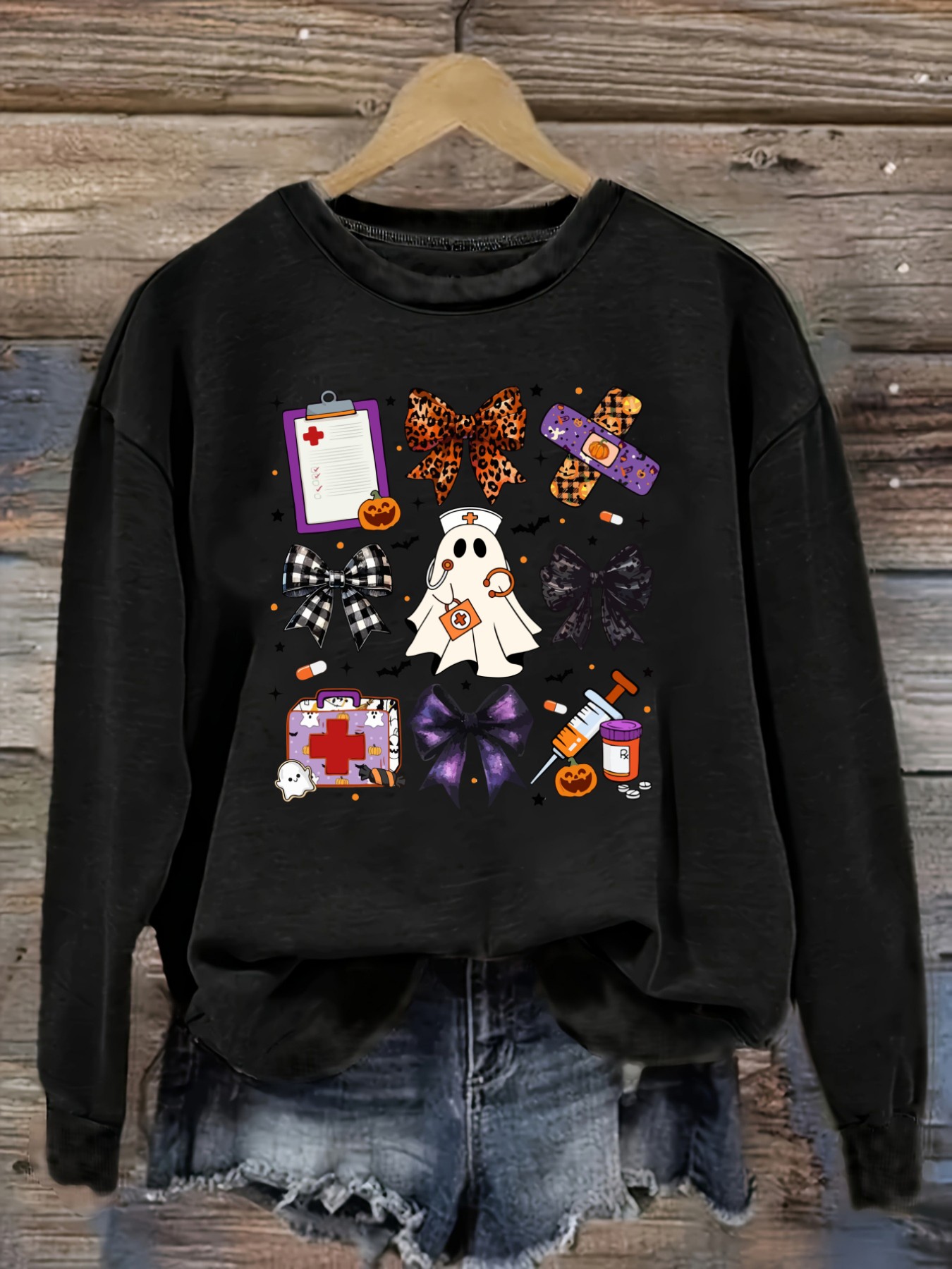 Winter Clothing Usa - เสื้อยืดแขนยาวคอกลมลำลองสำหรับผู้หญิง ลายพิมพ์ฮาโลวีน พยาบาล ผี โบว์ ดีไซน์คอกลม